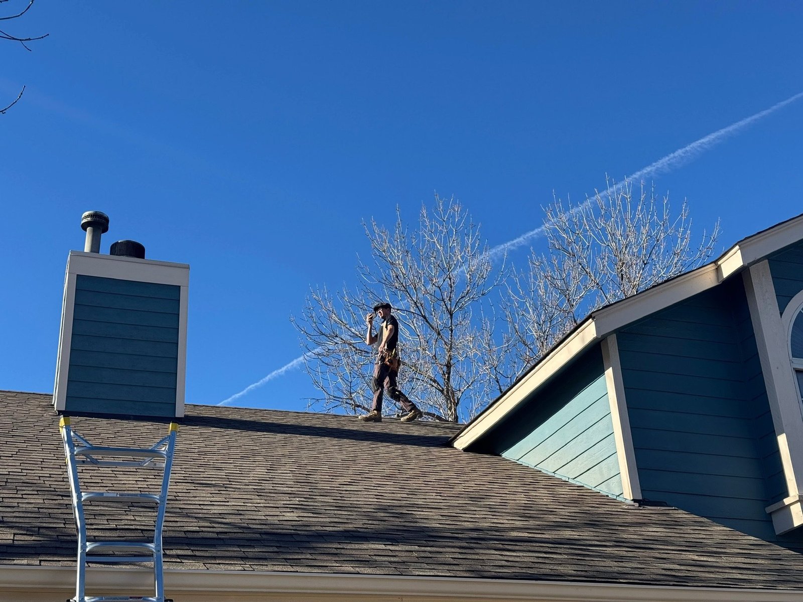 Boulder home inspector reviewing a roof