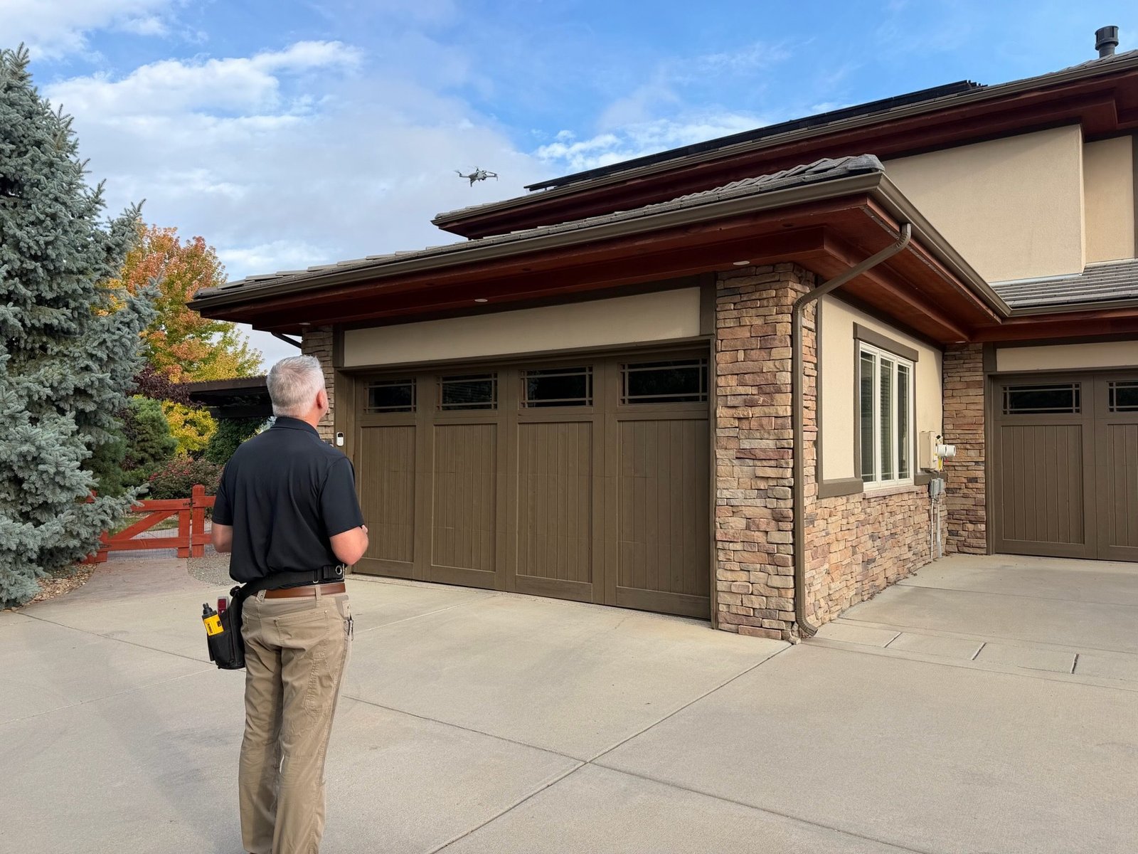 Boulder home inspector preparing a drone for roof documentation